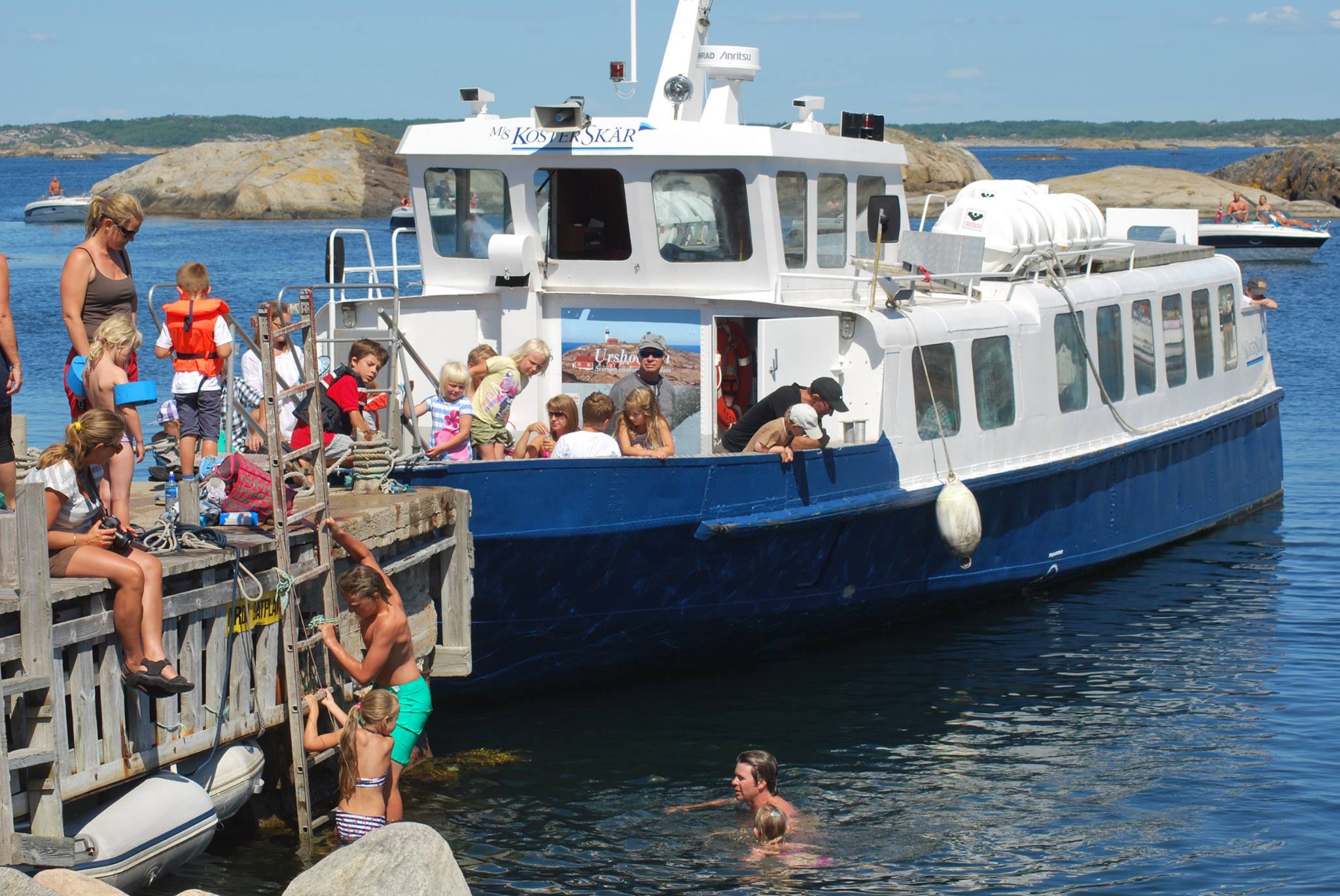 Boat tour with Kosterskär in harbour by the Koster Islands from Strömstad with Selin Charter